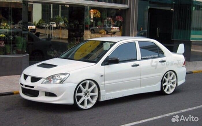 Накладки на пороги EVO на Mitsubishi Lancer 9