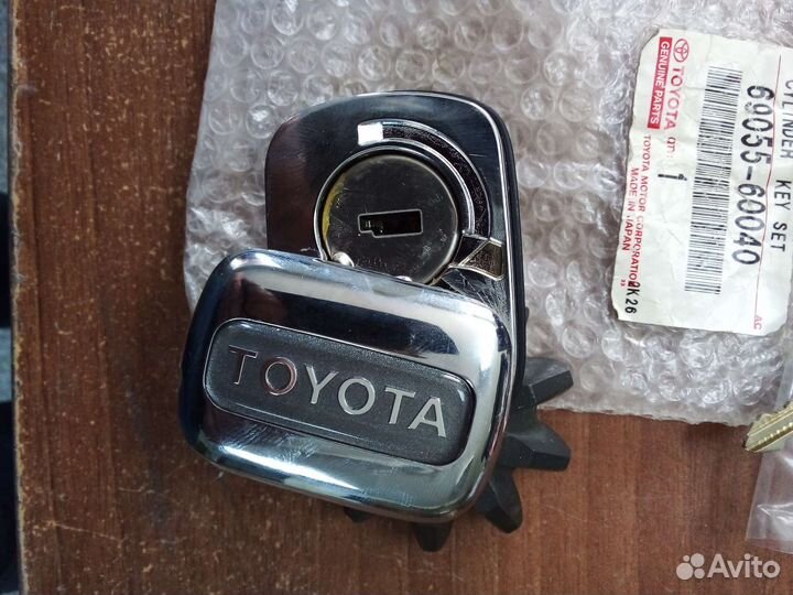 Замок двери багажника оригинал TLC 80 VX