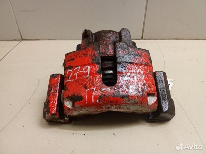 Суппорт тормозной передний правый Dodge Stratus