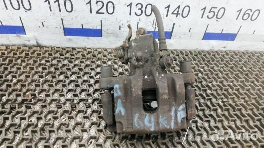 Суппорт тормозной задний левый nissan primera P12