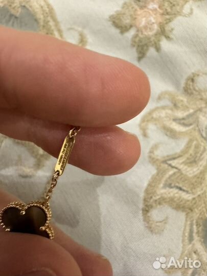 Золотой браслет и кольцо van cliff