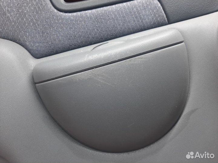 Обшивка двери передняя левая Toyota Funcargo NCP20