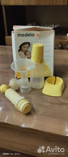 Молокоотсос medela ручной