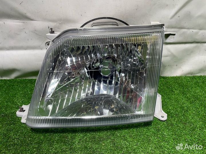 Фара галогеновая передняя левая Toyota Land
