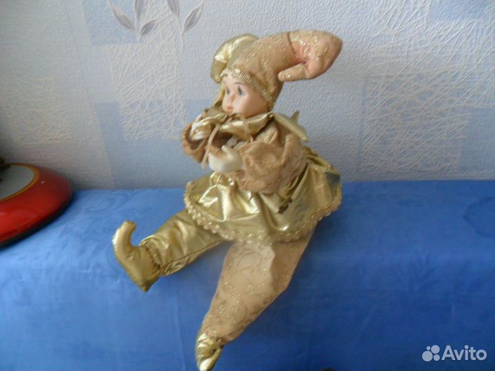 Музыкальный заводной клоун. 28 см. Красивый