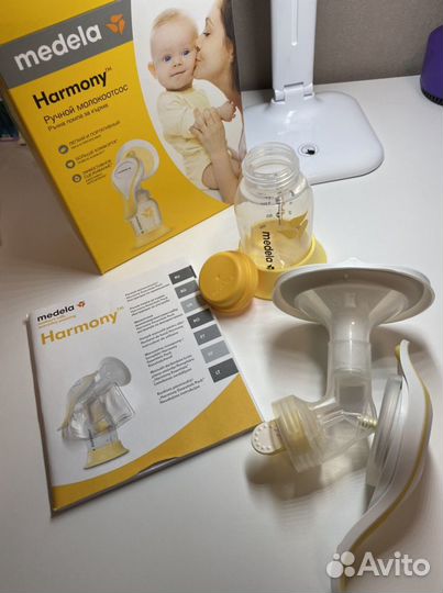 Молокоотсос medela новый