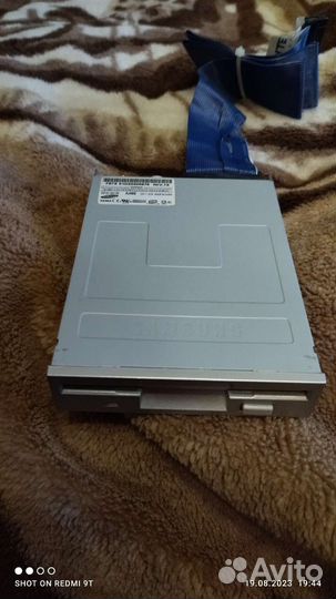 Дисковод Samsung SFD-321B