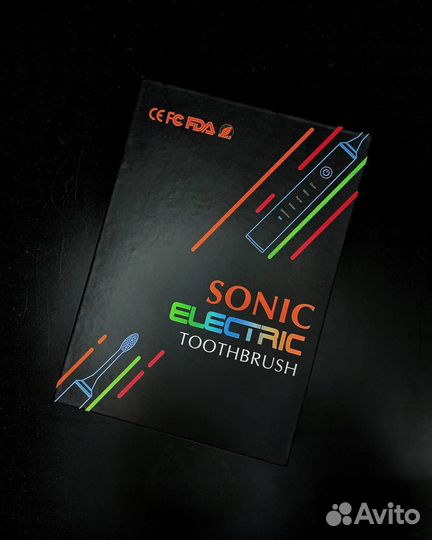 Электрическая зубная щетка