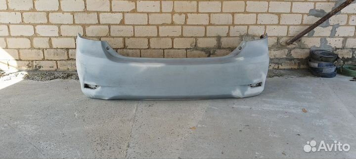 Бампер Toyota Corolla Е 140, Е150