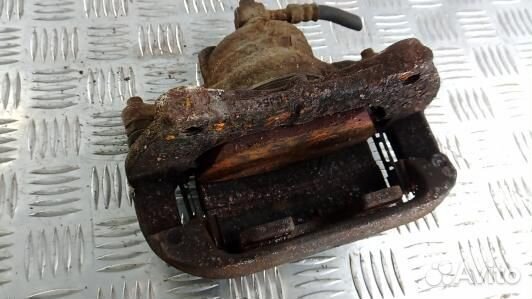 Суппорт тормозной передний правый opel astra J (NE