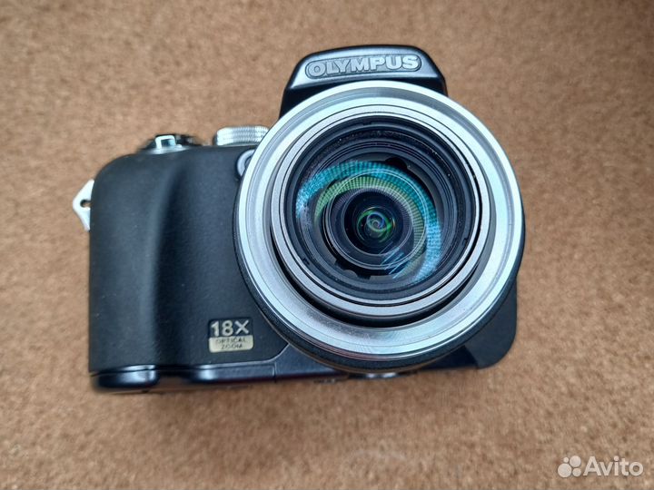 В ремонт Olympus sp-550uz