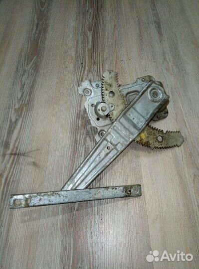 Стеклоподъемник задний Nissan micra K12 Лев