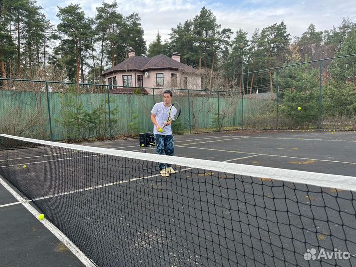 Тренер по большому теннису