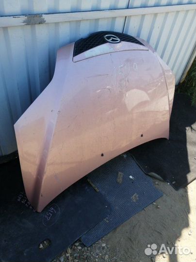 Капот Mazda Demio DY
