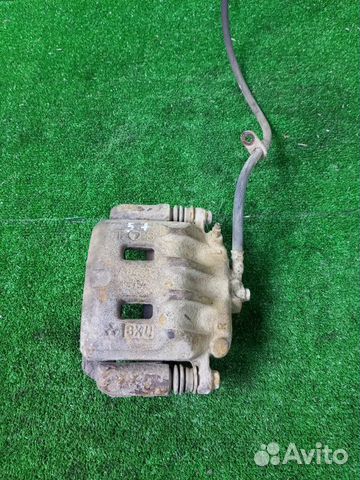 Суппорт тормозной передний левый Subaru Legacy