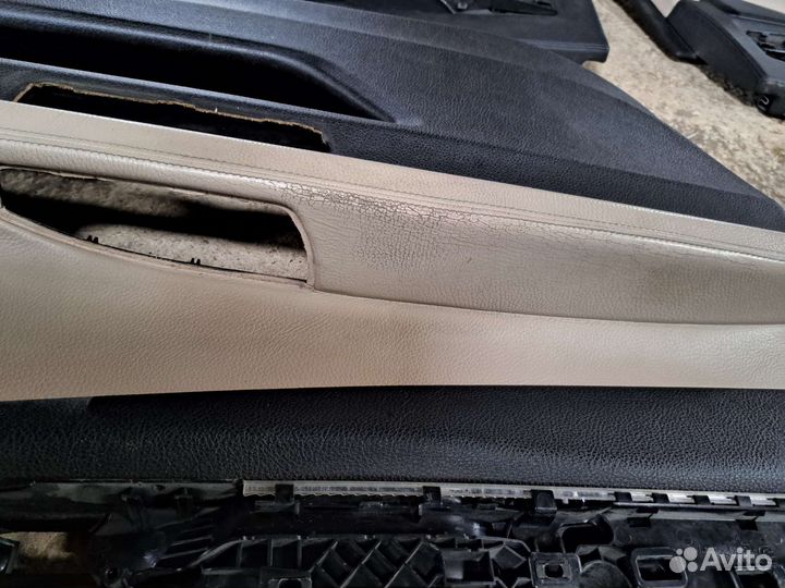 Обшивка двери на BMW F01