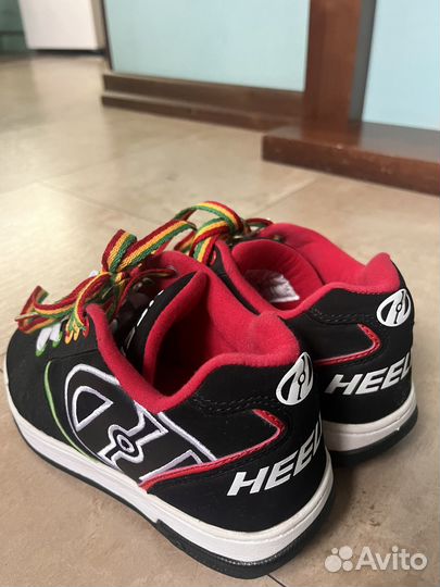 Кроссовки на роликах heelys