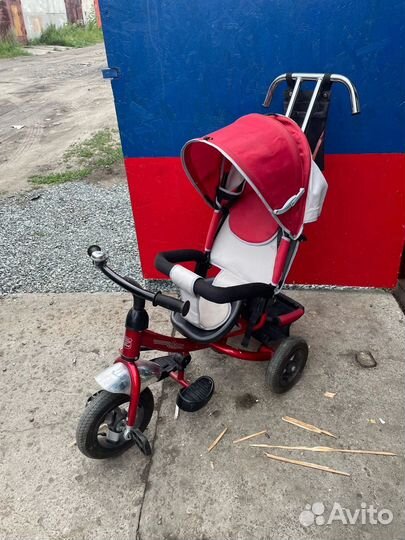 Трехколесный велосипед с ручкой