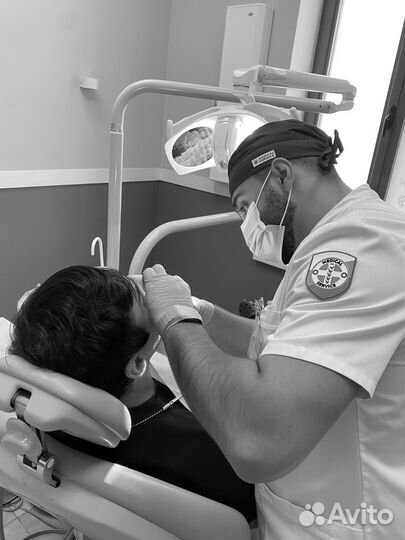 Врач стоматолог хирург