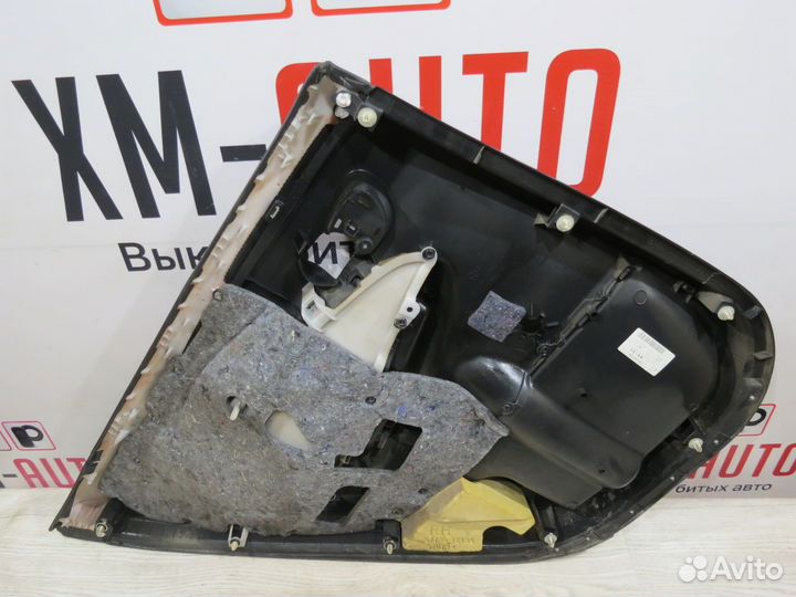 Обшивка двери задняя правая Toyota Corolla 150