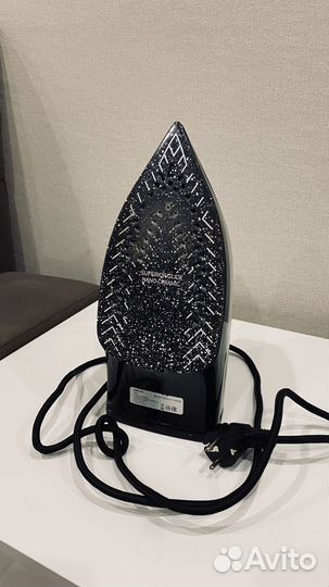 Гладильная доска и утюг