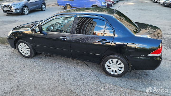 Mitsubishi Lancer 1.6 МТ, 2009, 194 200 км