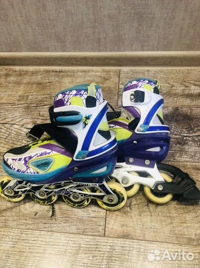 Роликовые коньки Action abec 7