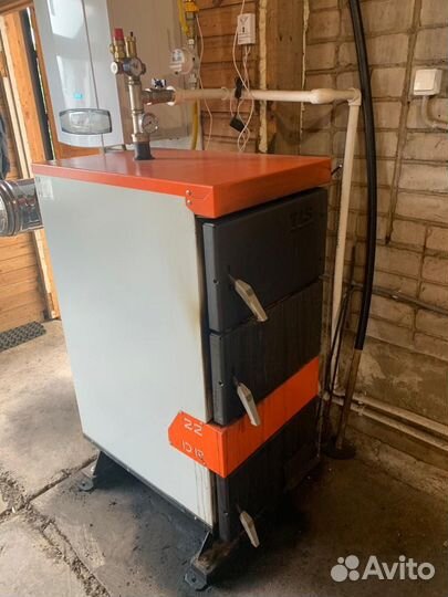 Продаю твердотопливный котел длительного горения
