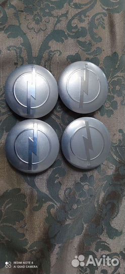 Колпачки на литые диски Opel