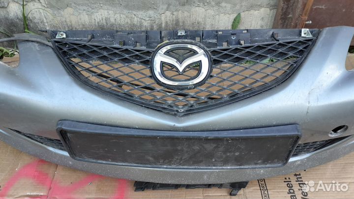 Передний бампер Mazda 6 (02-05) дорест