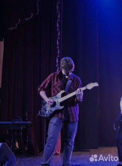 Репетитор по игре на гитаре