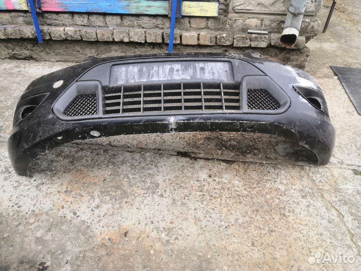 Бампер с решеткой передний б/у после ремонта