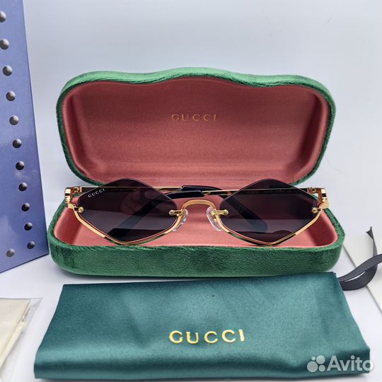 Солнцезащитные очки Gucci GG1604s 001