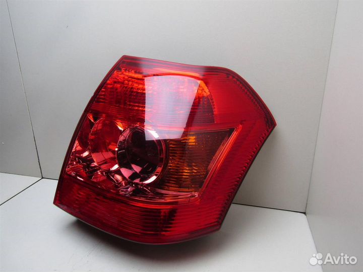 Фонарь задний левый Toyota Corolla E12 2001-2006