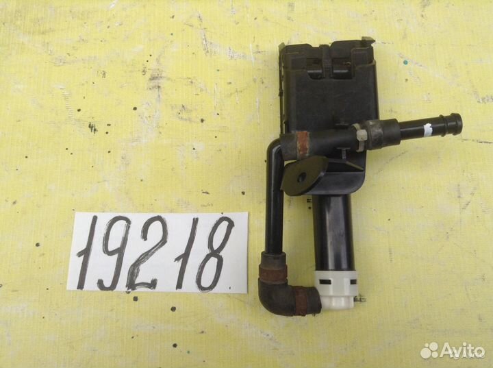 Mazda 6 форсунка омывателя фары левая