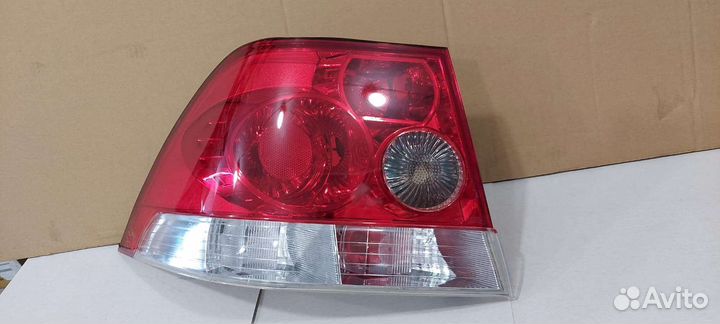 Фонарь левый Opel Astra H седан