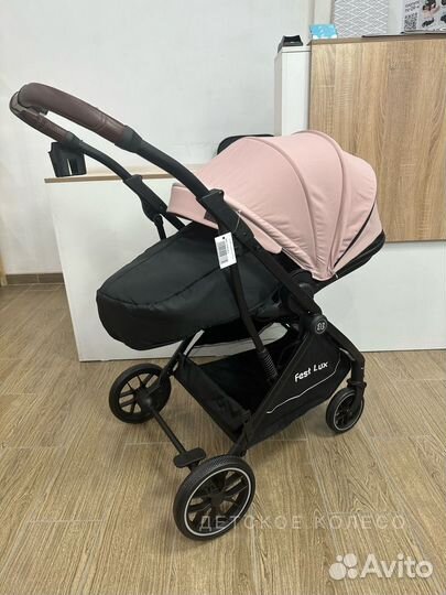 Коляска с перекидной ручкой, реверсивный блок