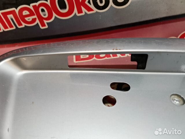 Накладка крышки багажника задняя Mitsubishi Lancer