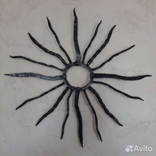 Кованое солнце