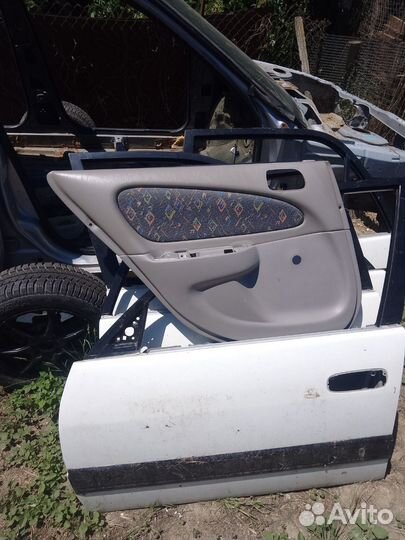 Карта двери передняя левая Toyota Corolla ee111