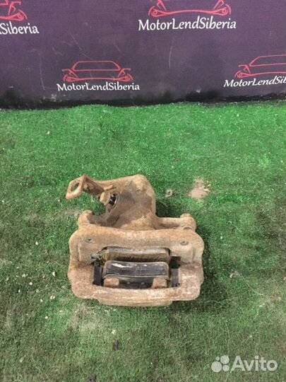 Суппорт задний правый Hyundai Solaris RB G4FC 2012