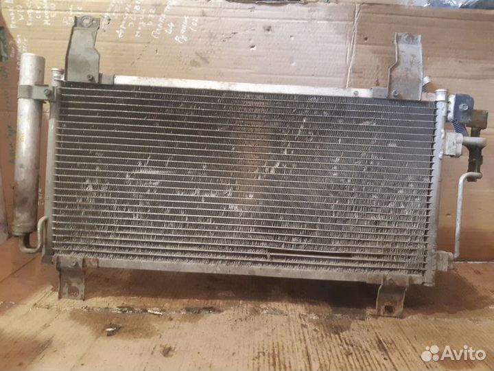 Радиатор кондиционера Mazda 6GG 1.8
