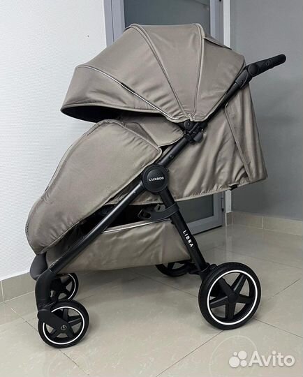 Прогулочная коляска на больших колёсах