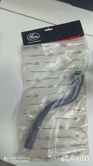 Патрубок печки выпускной Opel Astra H