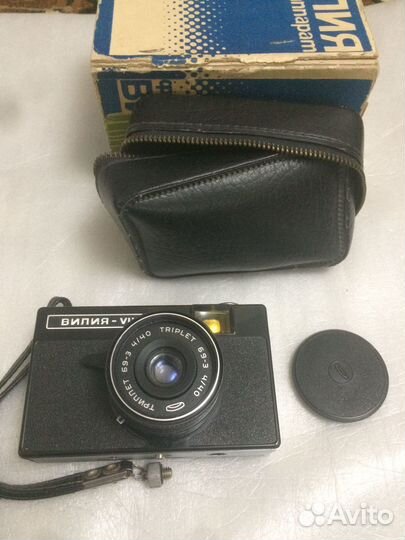 Старые фотоаппараты и кинокамера Аврора