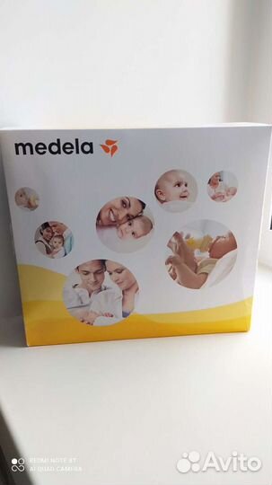 Молокоотсос medela электрический
