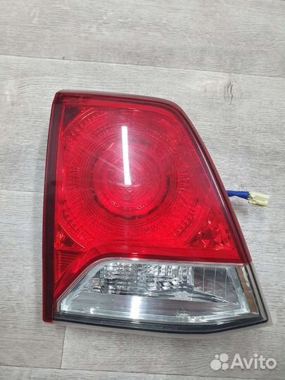 Левый фонарь в крышку багажника лк 200