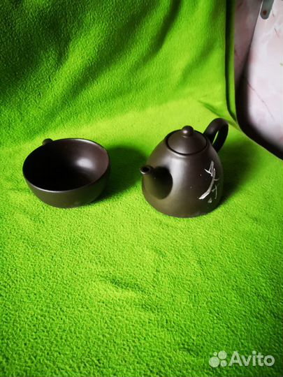 Заварочный глиняный китайский чайник и чашка пиала