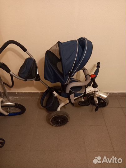 Трехколесный велосипед с ручкой