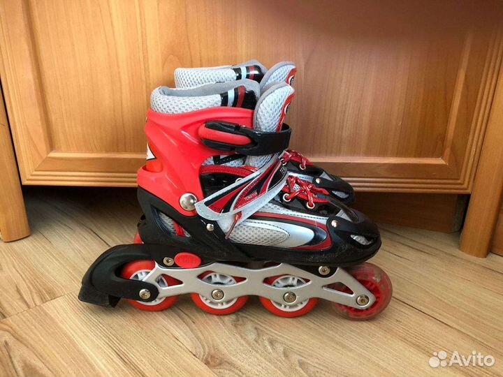 Роликовые коньки